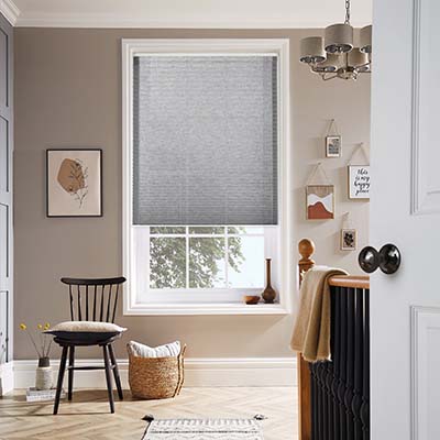 pleated blinds on a landing voile moondust