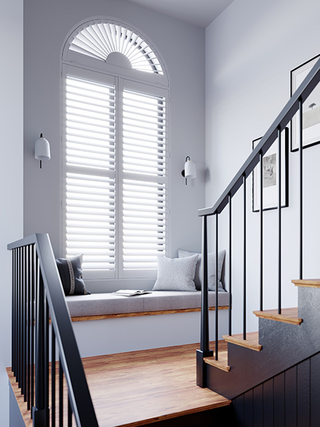 made to measure shutters in a stairway by sewards blinds