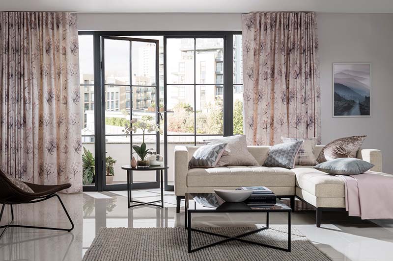 motorised curtain rail for floor to ceiling curtains in modern lounge