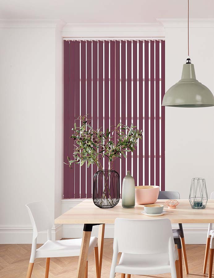 purple vertical blinds in dining room window