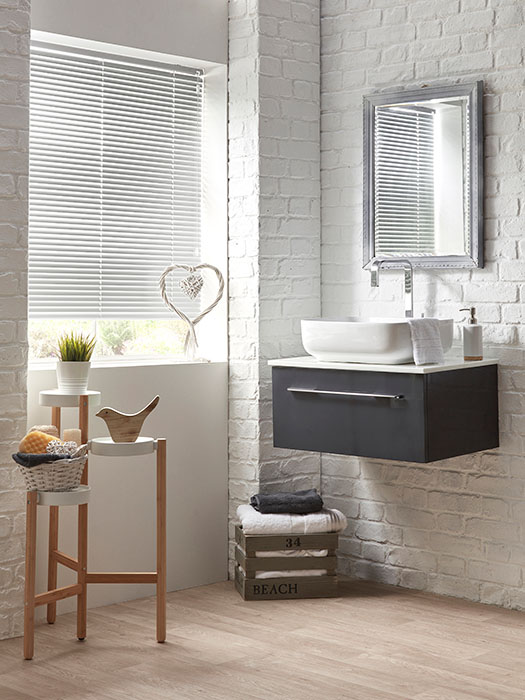 white venetian blinds in a bathroom setting