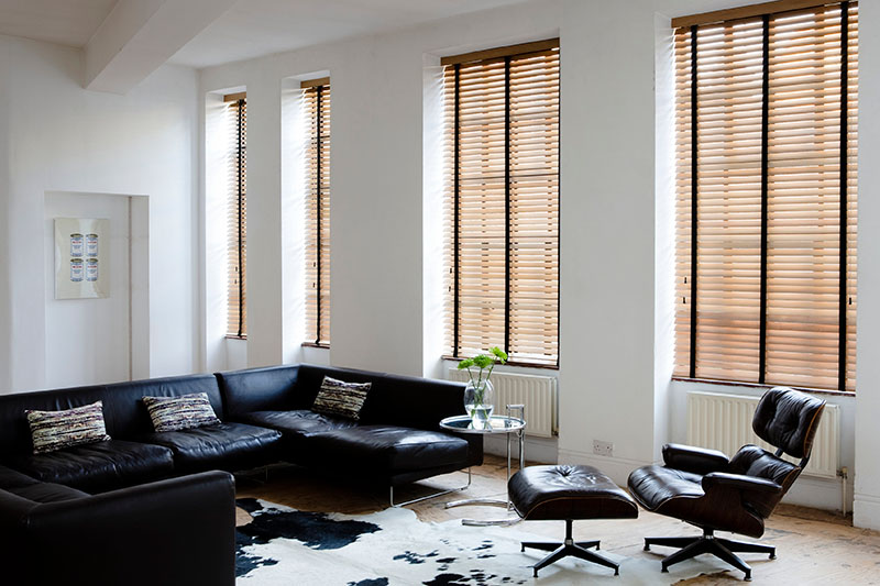 wooden venetians in loft house tawny with tapes